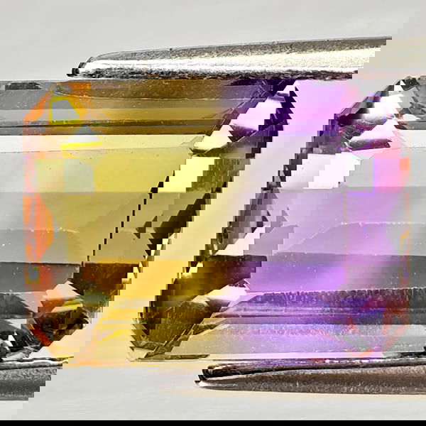 Natural Bi Color Ametrine 4.37 Ct. Octagon Shape 10.8 x 8 Mm Gemstone From Bolivia: Product ID: 800408239 Product Name: Natural Ametrine Weight: 4.37 CT. Size: 10.8 x 8 x 6.4 MM. Shape: Octagon Color: Bi Color Clarity:VSI Luster: Good Gems Origin: Bolivia Treatment: Unheated Crystal