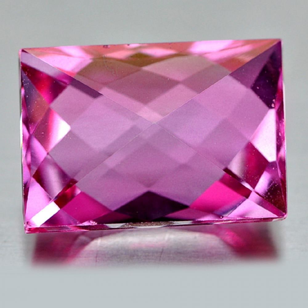 Natural Pink Topaz 10.06 Ct. Baguette Shape 14 x 9.9 Mm Gemstone From Brazil: Product ID: 807136467 Product Name: Natural Topaz Weight: 10.06 CT. Size: 14 x 9.9 x 7.1 MM. Shape: Baguette Fancy Cut Color: Pink Clarity:IF Luster: Very Good Gems Origin: Brazil Treatment: Treated C