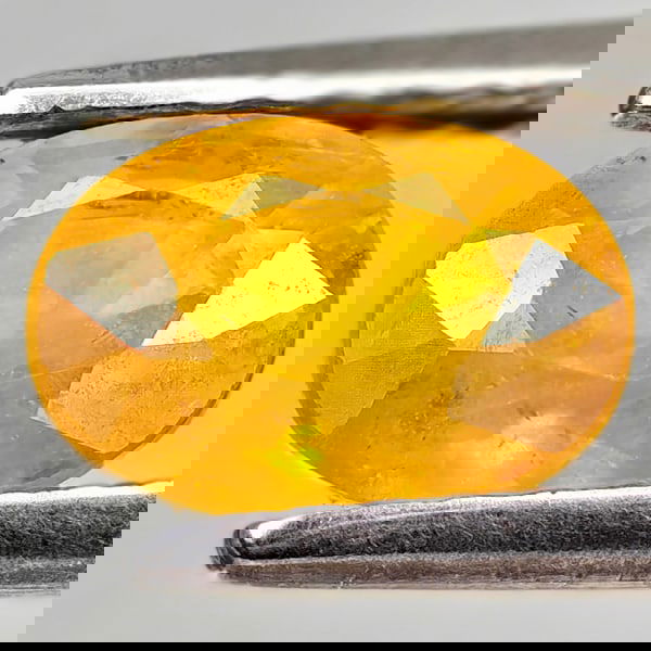 Natural Yellow Sapphire 1.45 Ct. Oval Shape 7.1 x 5.1 Mm Gemstone From Thailand: Product ID: 806162591 Product Name: Natural Yellow Sapphire Weight: 1.45 CT. Size: 7.1 x 5.1 x 4.3 MM. Shape: Oval Color: Yellow Clarity:VSI - SI1 Luster: Good Gems Origin: Thailand Treatment: Heated