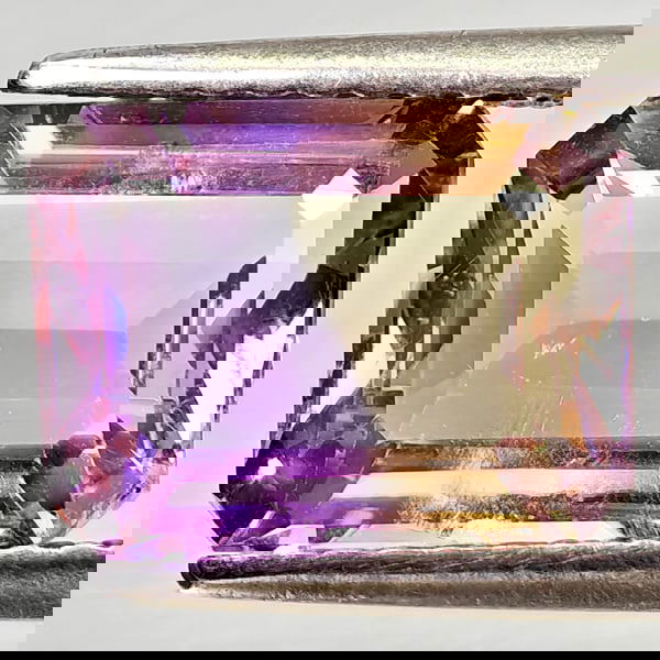 Natural Bi Color Ametrine 2.92 Ct. Octagon Shape 10 x 7.6 Mm Gemstone from Bolivia: Product ID: 800408245 Product Name: Natural Ametrine Weight: 2.92 CT. Size: 10 x 7 x 5.1 MM. Shape: Octagon Color: Bi Color Clarity:VSI Luster: Good Gems Origin: Bolivia Treatment: Unheated Crystal St