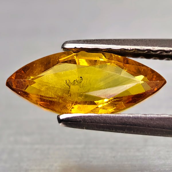 Natural Yellow Sapphire 1.28 Ct. Marquise Shape 10.5 x 4.7 Mm Gemstone from Thailand: Product ID: 806162571 Product Name: Natural Yellow Sapphire Weight: 1.28 CT. Size: 10.5 x 4.7 x 3.2 MM. Shape: Marquise Shape Color: Yellow Clarity:VSI - SI1 Luster: Good Gems Origin: Thailand Treatme
