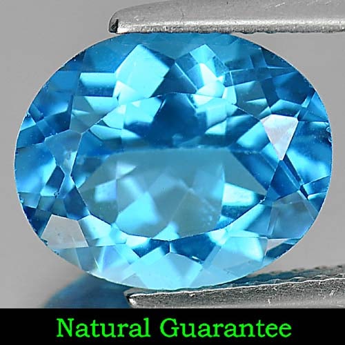 Natural Swiss Blue Topaz 5.24 Ct. Oval Shape 12 x 10 Mm Gemstone from Brazil: Product ID: 807161068 Product Name: Natural Blue Topaz Weight: 5.24 CT. Size: 12 x 10 x 6.2 MM. Shape: Oval Color: Swiss Blue Clarity:VVS Luster: Good Gems Origin: Brazil Treatment: Treated Crystal St