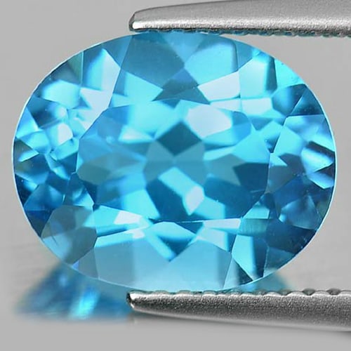 Natural Swiss Blue Topaz 4.33 Ct. VVS Oval Shape 11 x 9 Mm. Gemstone From Brazil: Product ID: 807160647 Product Name: Natural Blue Topaz Weight: 4.33 CT. Size: 11 x 9 x 6.2 MM. Shape: Oval Color: Swiss Blue Clarity:VVS Luster: Good Gems Origin: Brazil Treatment: Treated Crystal Str