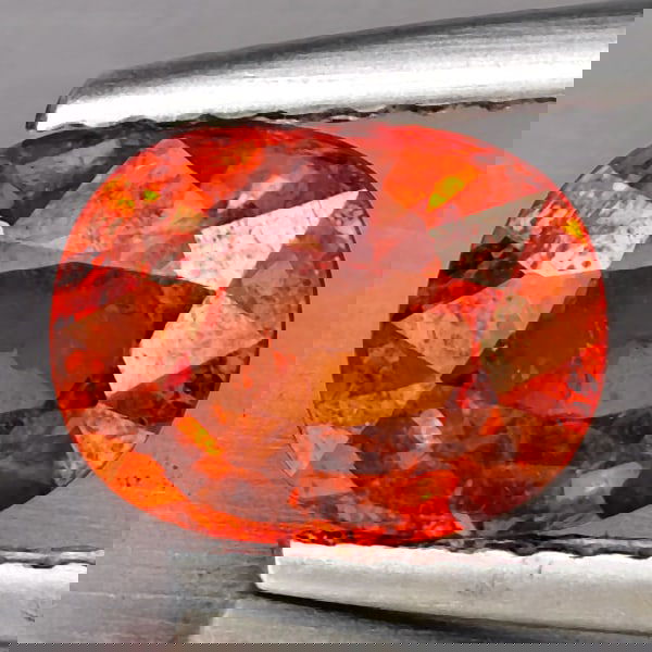Natural Orangish Red Spessartine Garnet 1.77 Ct. Oval Shape 7.7 x 6 Mm Gemstones From Namibia: Product ID: 802937955 Product Name: Natural Garnet Weight: 1.77 CT. Size: 7.7 x 6 x 4.2 MM. Shape: Oval Color: Orangish Red Clarity:SI1 Luster: Good Gems Origin: Namibia Treatment: Unheated Crystal St