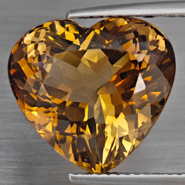 Natural Imperial Topaz 14.26 Ct. VVS Heart Shape 15.6 x 9.5 Mm. Gemstone From Brazil: Product ID: 807169082 Product Name: Natural Topaz Weight: 14.26 CT. Size: 15.6 x 9.5 x 4.1 MM. Shape: Heart Shape Color: Imperial Clarity:VVS Luster: Very Good Gems Origin: Brazil Treatment: None Crys
