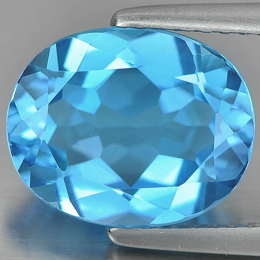 Natural Swiss Blue Topaz 4.14 Ct. Oval Shape 11 x 9 Mm. Gemstone From Brazil: Product ID: 807160643 Product Name: Natural Blue Topaz Weight: 4.14 CT. Size: 11 x 9 x 5.3 MM. Shape: Oval Color: Blue Clarity:VVS Luster: Good Gems Origin: Brazil Treatment: Treated Crystal Structure