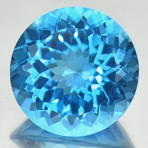 Natural Swiss Blue Topaz 13.53 Ct. Clean Round Cornflower Cut 15 Mm. Gemstone From Brazil: Product ID: 807166775 Product Name: Natural Blue Topaz Weight: 13.53 CT. Size: 15 x 15 x 9 MM. Shape: Round Color: Blue Clarity:IF Luster: Very Good Gems Origin: Brazil Treatment: Treated Crystal Stru
