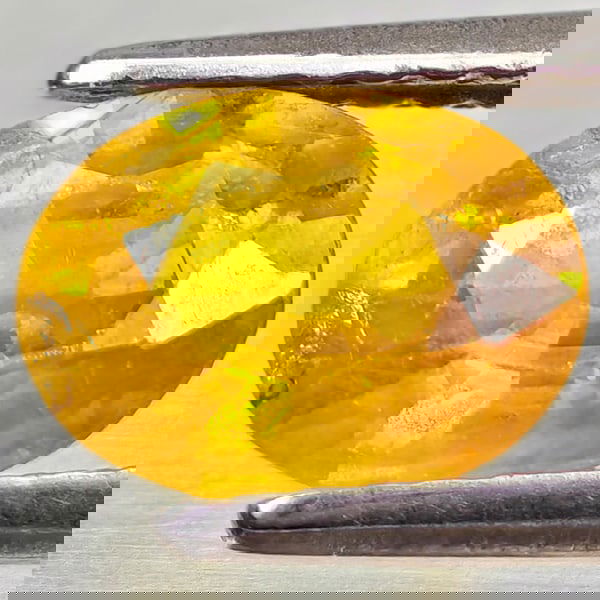 Natural Yellow Sapphire 1.42 Ct. Oval Shape 7.9 x 6 Mm Gemstone From Thailand: Product ID: 806162597 Product Name: Natural Yellow Sapphire Weight: 1.42 CT. Size: 7.9 x 6 x 3.5 MM. Shape: Oval Color: Yellow Clarity:VSI - SI1 Luster: Good Gems Origin: Thailand Treatment: Heated Cr