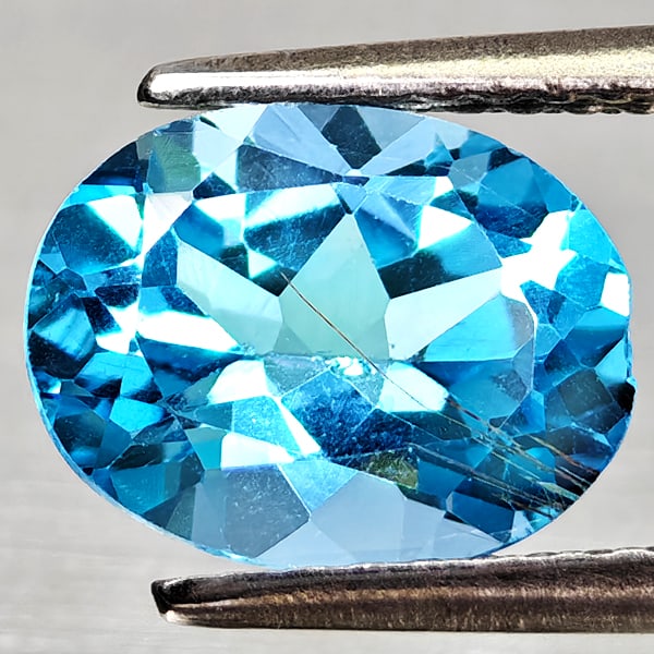 Natural Swiss Blue Topaz 2.22 Ct. Oval Shape 9.1 x 7 Mm Gemstone From Brazil: Product ID: 807168132 Product Name: Natural Blue Topaz Weight: 2.22 CT. Size: 9.1 x 7 x 4.7 MM. Shape: Oval Shape Color: Swiss Blue Clarity:VVS - VSI Luster: Good Gems Origin: Brazil Treatment: Treate