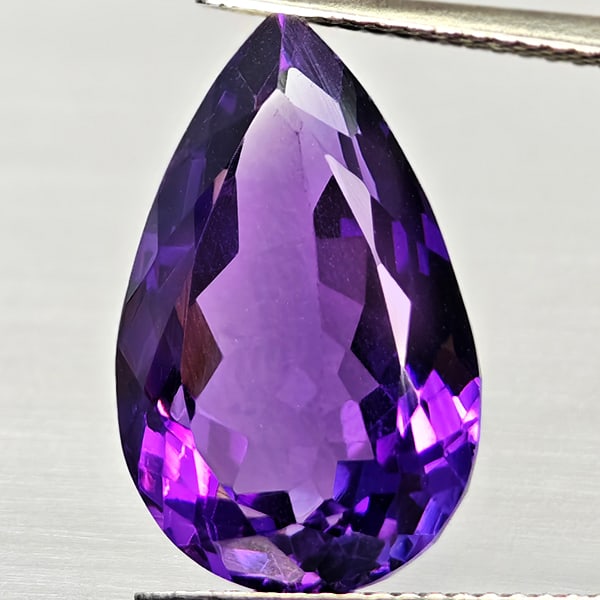 Natural Purple Amethyst 11.36 Ct. Pear Shape 18.2 x 11.5 Mm Gemstone From Brazil: Product ID: 800325499 Product Name: Natural Ametrine Weight: 11.36 CT. Size: 18.2 x 11.5 x 9 MM. Shape: Pear Shape Color: Purple Clarity:VSI Luster: Good Gems Origin: Brazil Treatment: Unheated Crysta