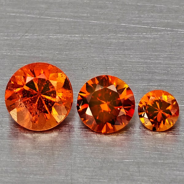Natural Orange Songea Sapphire 0.26 Ct. 3 Pcs Round Diamond Cut Gemstones from Tanzania: Product ID: 806162882 Product Name: Natural Orange Sapphire Weight: 0.26 CT. Size: 3.2 x 3.2 x 2.3 to 2 x 2 x 1.3 MM. Shape: Round Diamond Cut Color: Orange Clarity:SI1 Luster: Good Gems Origin: Tanza