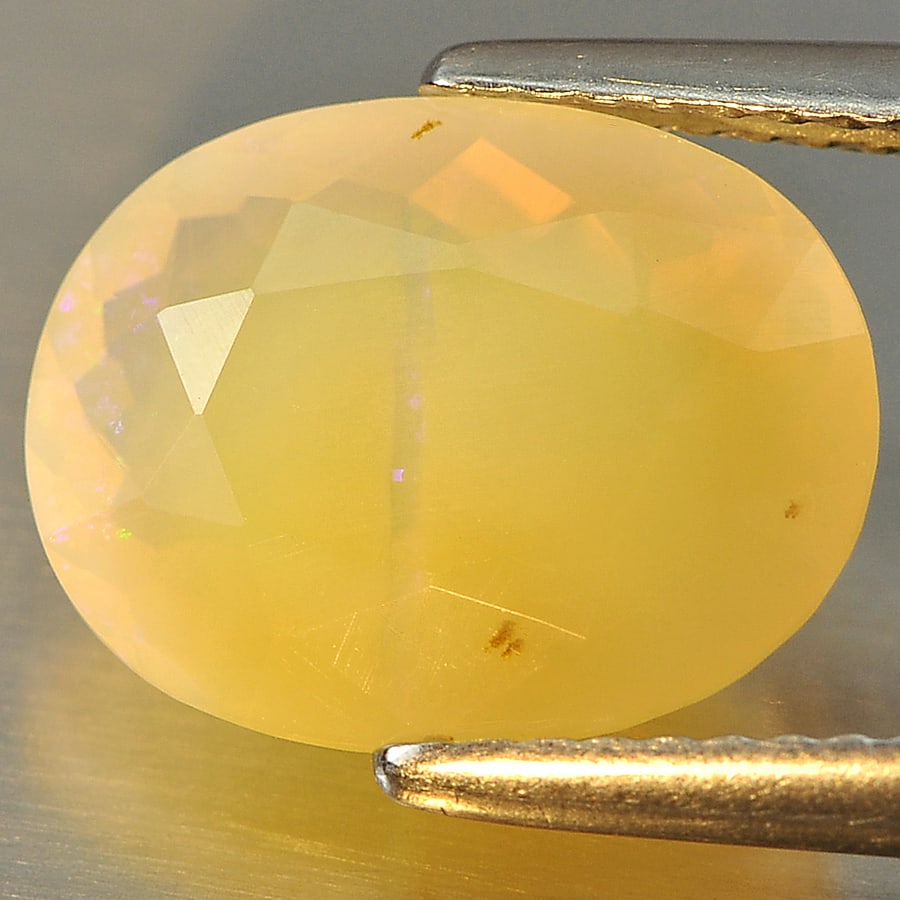 Natural Multi Color Opal 2.72 Ct. Oval Shape 12.2 x 9.4 Mm Gemstone from Ethiopia (1 of 3)