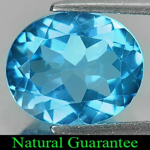 Natural Swiss Blue Topaz 5.09 Ct. Oval Shape 12 x 10 Mm Gemstone from Brazil: Product ID: 807161103 Product Name: Natural Blue Topaz Weight: 5.09 CT. Size: 12 x 10 x 6 MM. Shape: Oval Color: Swiss Blue Clarity:VVS Luster: Good Gems Origin: Brazil Treatment: Treated Crystal Stru