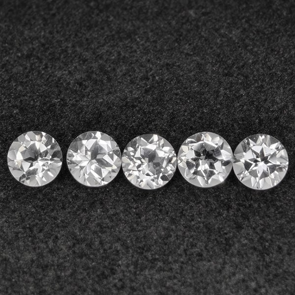 Natural White Topaz 5.21 Ct. 5 Pcs Round Shape 6.2 Mm Gemstone from Brazil: Product ID: 807168781 Product Name: Natural Topaz Weight: 5.21 CT. Size: 6.2 x 6.2 x 4 MM. Shape: Round Color: White Clarity:VSI Luster: Good Gems Origin: Brazil Treatment: Unheated Crystal Structure: