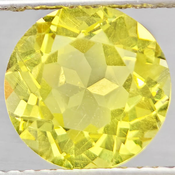 Natural Yellow Lemon Quartz 2.55 Ct. Round Shape 9.1 Mm Gemstone From Brazil: Product ID: 805530205 Product Name: Natural Quartz Weight: 2.55 CT. Size: 9.1 x 9.1 x 5.6 MM. Shape: Round Color: Yellow Lemon Clarity:VSI Luster: Good Gems Origin: Brazil Treatment: Unheated Crystal