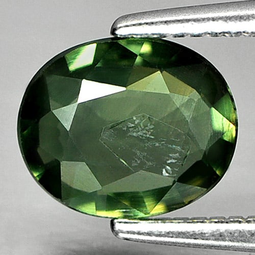 Natural Green Sapphire 1.11 Ct. Oval Shape 7.3 x 6 Mm Gemstone from Thailand: Product ID: 806148744 Product Name: Natural Green Sapphire Weight: 1.11 CT. Size: 7.3 x 6 x 2.7 MM. Shape: Oval Color: Green Clarity:SI Luster: Good Gems Origin: Thailand Treatment: Heated Crystal Str
