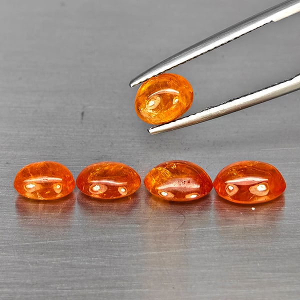 Natural Orangish Red Spessartine Garnet 8.34 Ct. 5 Pcs Oval Cabochon Shape Gemstones From Namibia: Product ID: 802937991 Product Name: Natural Garnet Weight: 8.34 CT. Size: 8.3 x 6.3 x 4 to 7.3 x 5.6 x 3.9 MM. Shape: Oval Cabochon Color: Orangish Red Clarity:SI1 Luster: Good Gems Origin: Namibia Tr