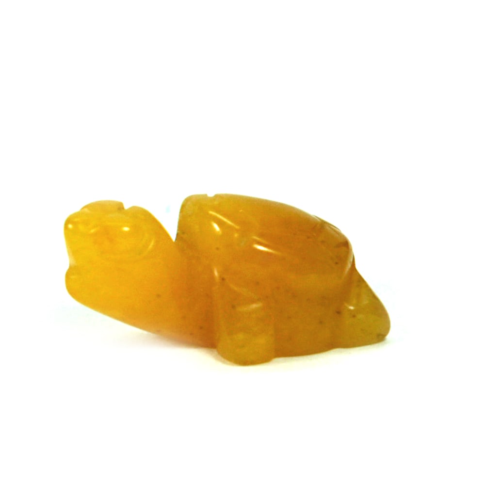 Natural Honey Jade 15.77 Ct. Turtle Carving Size 22 x 14 Mm Gemstone from Thailand: Product ID: 818102524 Product Name: Natural Gemstones Weight: 15.77 CT. Size: 14 x 22 x 10 MM. Shape: Caving Color: Honey Clarity:Opaque Luster: Semi-Transparent Gems Origin: Thailand Treatment: Unhea