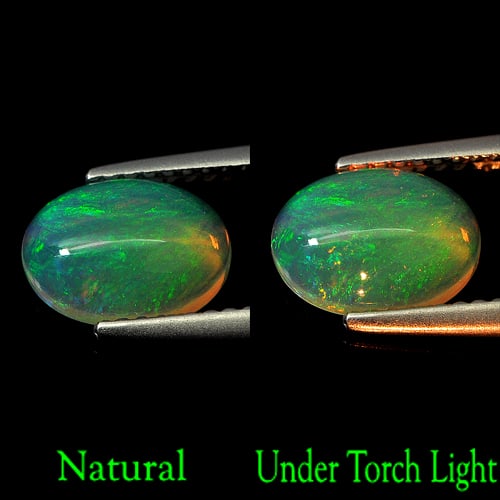 Natural Opal Multi Color 1.17 Ct. Oval Cabochon Shape 9 x 6.8 Mm. Gemstone Unheated: Product ID: 818727106 Product Name: Natural Opal Weight: 1.17 CT. Size: 9 x 6.8 x 3.6 MM. Shape: Oval Cabochon Color: Multi-Color Clarity:Semi - Transparent Luster: Iridescent Gems Origin: Ethiopia Tr
