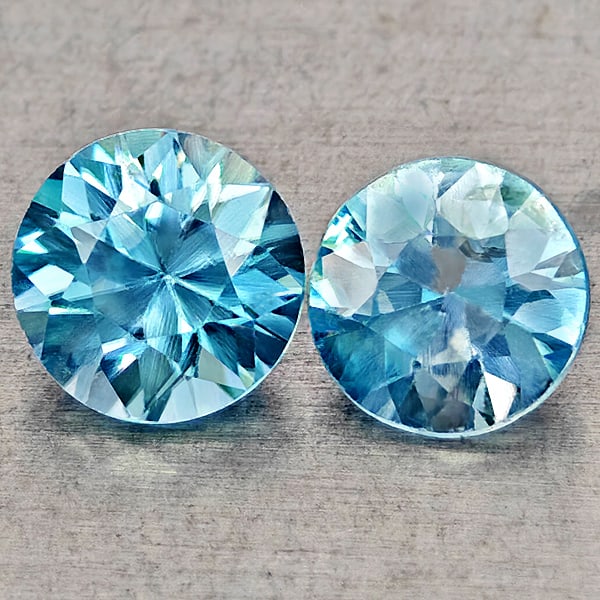 Natural Blue Zircon 1.53 Ct. 2 Pcs Round Diamond Cut 5.5 Mm Gemstones From Cambodia: Product ID: 807743039 Product Name: Natural Zircon Weight: 1.53 CT. Size: 5.5 x 5.5 x 3.7 MM. Shape: Round Diamond Cut Color: Blue Clarity:VSI Luster: Good Gems Origin: Cambodia Treatment: Heated Crys