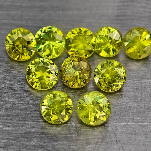 Natural Green Demantiod Garnet 1.71 Ct. 10 Pcs Round Diamond Cut 3.3 Mm Gemstones From Madagascar: Product ID: 802937655 Product Name: Natural Demantoid Weight: 1.71 CT. Size: 3.3 x 3.3 x 2.5 MM. Shape: Round Diamond Cut Color: Green Clarity:SI1 Luster: Good Gems Origin: Madagascar Treatment: Unhea