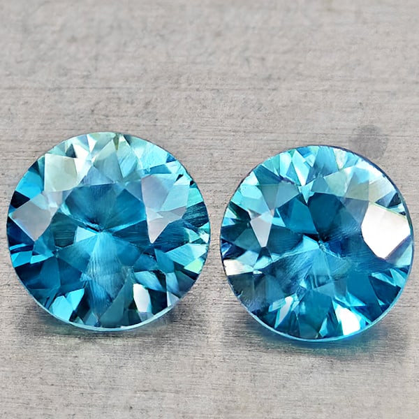 Natural Blue Zircon 1.32 Ct. 2 Pcs Round Diamond Cut 5.1 Mm Gemstones from Cambodia: Product ID: 807743038 Product Name: Natural Zircon Weight: 1.32 CT. Size: 5.1 x 5.1 x 3 MM. Shape: Round Diamond Cut Color: Blue Clarity:VSI Luster: Good Gems Origin: Cambodia Treatment: Heated Crysta