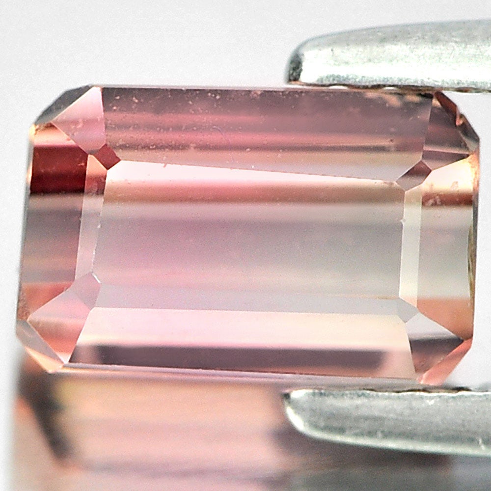 Natural Pink Tourmaline 1.63 Ct. Octagon Shape 7.5 x 4.8 Mm. Gemstone from Nigeria: Product ID: 807250288 Product Name: Natural Tourmaline Weight: 1.63 CT. Size: 7.5 x 4.8 x 4.3 MM. Shape: Octagon Color: Pink Clarity:VSI Luster: Good Gems Origin: Nigeria Treatment: Unheated Crystal S