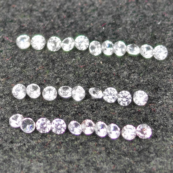 Natural White Zircon 0.64 Ct. 30 Pcs Round Diamond Cut 1.5 Mm Gemstone from Combodia: Product ID: 807743110 Product Name: Natural Zircon Weight: 0.64 CT. Size: 1.5 x 1.5 x 1.2 MM. Shape: Round Diamond Cut Color: White Clarity:VSI Luster: Good Gems Origin: Cambodia Treatment: Heated Cry