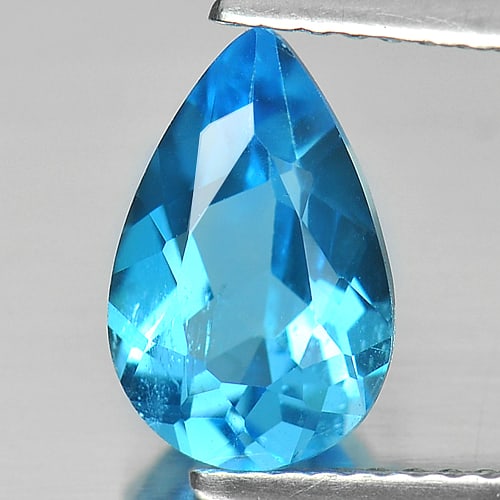 Natural Swiss Blue Topaz 2.16 Ct. Pear Shape 10.4 x 6.7 Mm Gemstone From Brazil: Product ID: 807149656 Product Name: Natural Blue Topaz Weight: 2.16 CT. Size: 10.4 x 6.7 x 4.4 MM. Shape: Pear Color: Swiss Blue Clarity:SI Luster: Good Gems Origin: Brazil Treatment: Treated Crystal