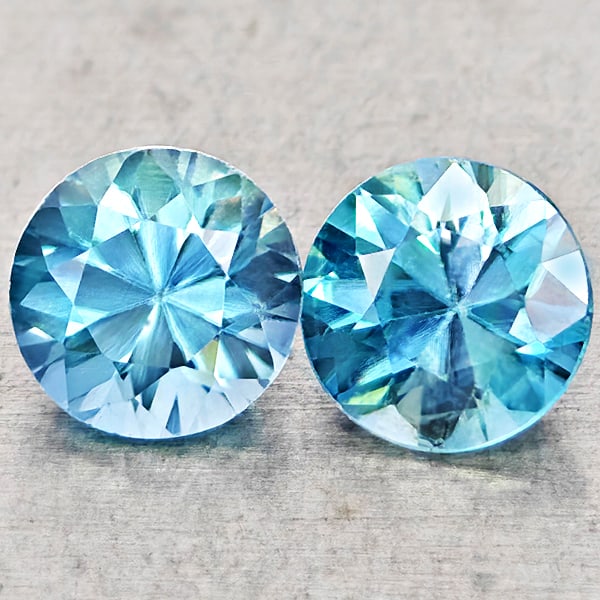Natural Blue Zircon 1.45 Ct. 2 Pcs Round Diamond Cut 5.1 Mm Gemstones From Cambodia: Product ID: 807743034 Product Name: Natural Zircon Weight: 1.45 CT. Size: 5.1 x 5.1 x 3.4 MM. Shape: Round Diamond Cut Color: Blue Clarity:VSI Luster: Good Gems Origin: Cambodia Treatment: Heated Crys