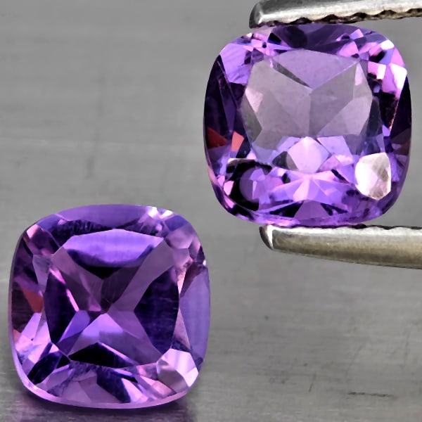 Natural Purple Amethyst 1.94 Ct. 2 Pcs Cushion Shape 6.2 Mm Gemstone From Brazil: Product ID: 800325569 Product Name: Natural Amethyst Weight: 1.94 CT. Size: 6.2 x 6.2 x 4.2 MM. Shape: Cushion Shape Color: Purple Clarity:SI1 Luster: Good Gems Origin: Brazil Treatment: Unheated Crys