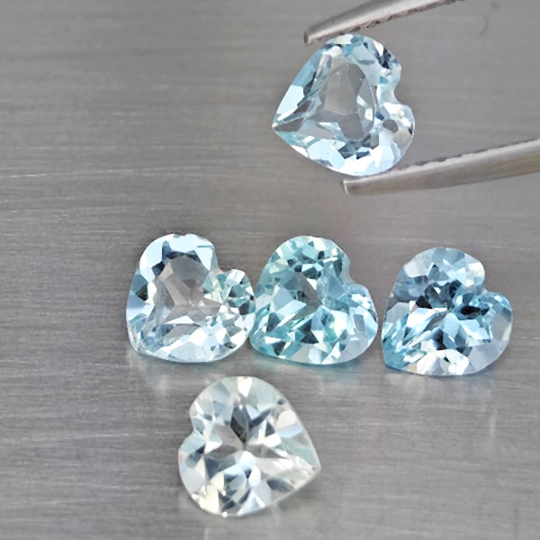 Natural Baby Blue Topaz 4.15 Ct. 5 Pcs Heart Shape Gemstones From Brazil: Product ID: 807168983 Product Name: Natural Blue Topaz Weight: 4.15 CT. Size: 6 x 6 x 3.8 to 5.8 x 5.8 x 3.9 MM. Shape: Heart Shape Color: Baby Blue Clarity:SI1 Luster: Good Gems Origin: Brazil Treatm