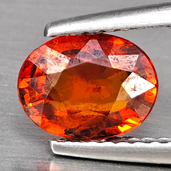 Natural Orangish Red Spessartine Garnet 1.47 Ct. Oval Shape 7.7 x 6 Mm Gemstones From Namibia: Product ID: 802937966 Product Name: Natural Garnet Weight: 1.47 CT. Size: 7.7 x 6 x 3.6 MM. Shape: Oval Shape Color: Orangish Red Clarity:SI1 Luster: Good Gems Origin: Namibia Treatment: Unheated Crys