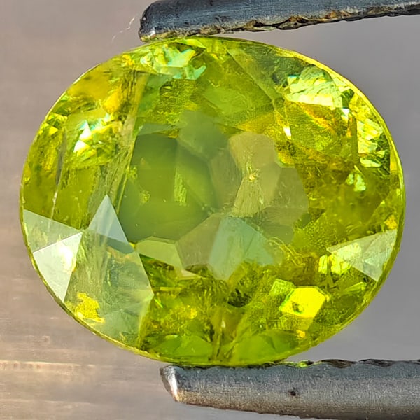 Natural Multi-Color With Rainbow Spark Sphene 1.58 Ct. Oval Shape 8 x 7 Mm Gemstone From Madagascar: Product ID: 806509211 Product Name: Natural Sphene Weight: 1.58 CT. Size: 8 x 7 x 3.8 MM. Shape: Oval Shape Color: Multi-Color Clarity:SI1 Luster: Good Gems Origin: Madagascar Treatment: Unheated Crys