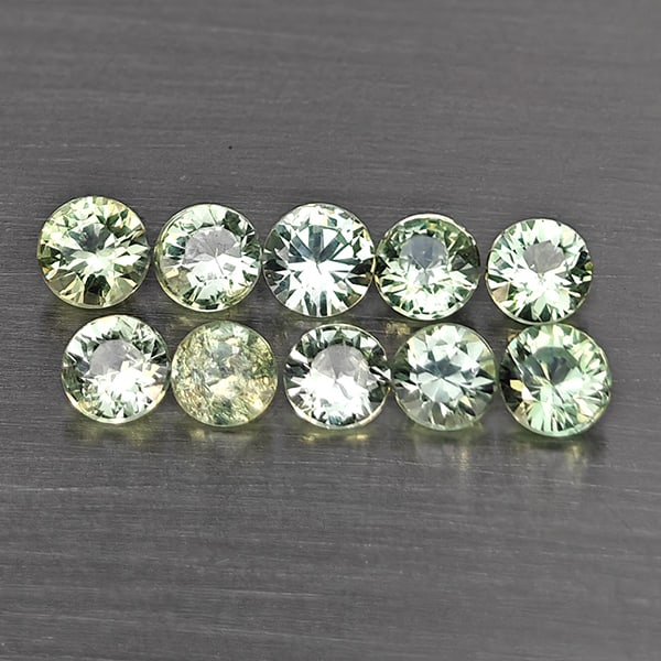 Natural Green Songea Sapphire 0.97 Ct. 10 Pcs Round Diamond Cut 2.8 Mm Gemstone from Tanzania: Product ID: 806130512 Product Name: Natural Blue Sapphire Weight: 0.97 CT. Size: 2.8 x 2.8 x 1.8 MM. Shape: Round Diamond Cut Color: Green Clarity:SI1 Luster: Good Gems Origin: Tanzania Treatment: Hea