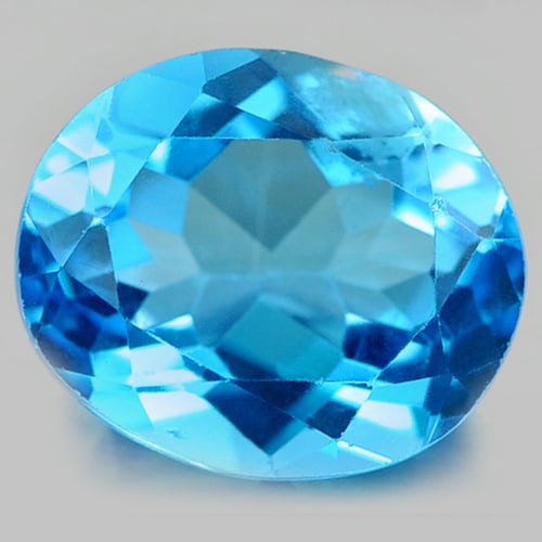 Natural Swiss Blue Topaz 6.05 Ct. Oval Shape 12 x 10 Mm. Gemstone From Brazil: Product ID: 807161220 Product Name: Natural Blue Topaz Weight: 6.05 CT. Size: 12 x 10 x 6.4 MM. Shape: Oval Color: Swiss Blue Clarity:VSI Luster: Good Gems Origin: Brazil Treatment: Treated Crystal St