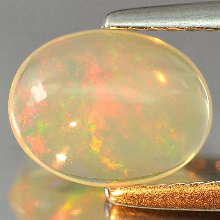 Natural Multi Color Play Of Colour Opal 1.11 Ct. Oval Cabochon Shape 9 x 7 Mm Gemstone from Ethiopia (1 of 3)