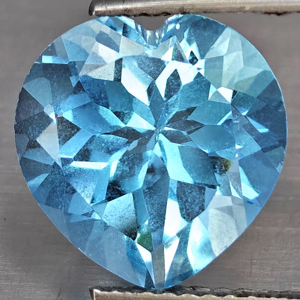 Natural Baby Blue Topaz 5.81 Ct. Heart Shape 11.3 Mm Gemstone From Brazil: Product ID: 807168776 Product Name: Natural Blue Topaz Weight: 5.81 CT. Size: 11.3 x 11.3 x 7.4 MM. Shape: Heart Shape Color: Baby Blue Clarity:VSI Luster: Good Gems Origin: Brazil Treatment: Treated