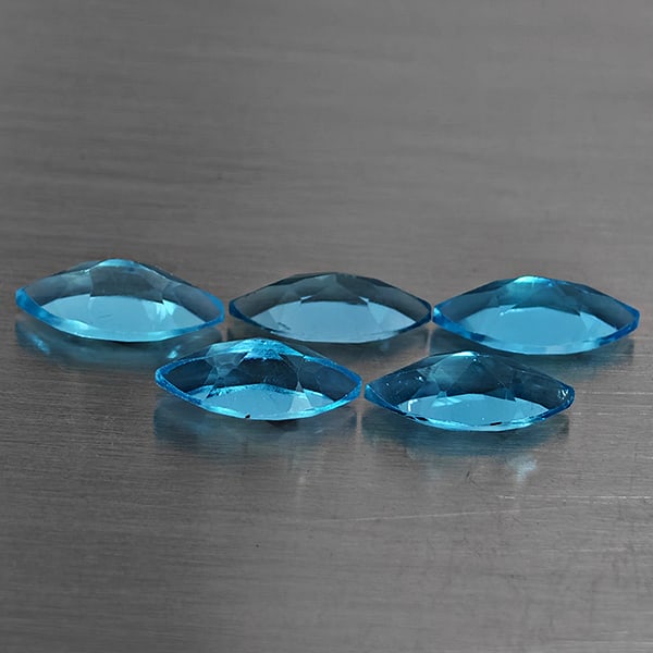 Natural Swiss Blue Topaz 5.78 Ct. 5 Pcs Marquise Shape 9.9 x 5.3 Mm Gemstone From Brazil: Product ID: 807168709 Product Name: Natural Blue Topaz Weight: 5.78 CT. Size: 9.9 x 5.3 x 3.5 MM. Shape: Marquise Shape Color: Swiss Blue Clarity:VSI Luster: Good Gems Origin: Brazil Treatment: Treate