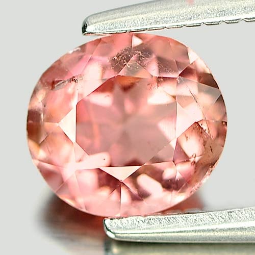 Natural Peach Pink Tourmaline 0.90 Ct. Oval Shape 6.4 x 5.7 Mm Gemstone From Nigeria: Product ID: 807245985 Product Name: Natural Tourmaline Weight: 0.90 CT. Size: 6.4 x 5.7 x 3.9 MM. Shape: Oval Color: Peach Pink Clarity:SI1 Luster: Good Gems Origin: Nigeria Treatment: Unheated Crysta