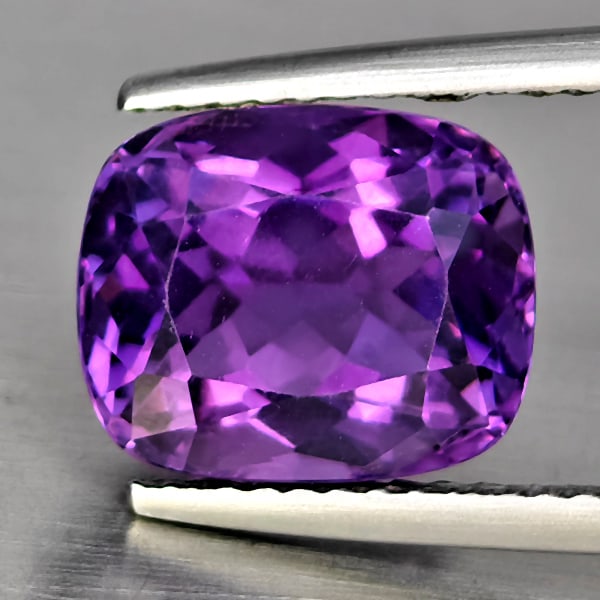 Natural Purple Amethyst 3.56 Ct. Cushion Shape 10.3 x 9 Mm Gemstone From Brazil: Product ID: 800325658 Product Name: Natural Amethyst Weight: 3.56 CT. Size: 10.3 x 9 x 6 MM. Shape: Cushion Shape Color: Purple Clarity:VSI Luster: Good Gems Origin: Brazil Treatment: Unheated Crystal