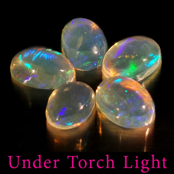 Natural Multi Color Opal 1.39 Ct. 5 Pcs Oval Cabochon Shape 6 x 4.2 Mm Gemstone from Ethiopia: Product ID: 818728110 Product Name: Natural Opal Weight: 1.39 CT. Size: 6 x 4.2 x 2.3 MM. Shape: Oval Cabochon Color: Multi-Color Clarity:Semi - Transparent Luster: Good Gems Origin: Ethiopia Treatmen