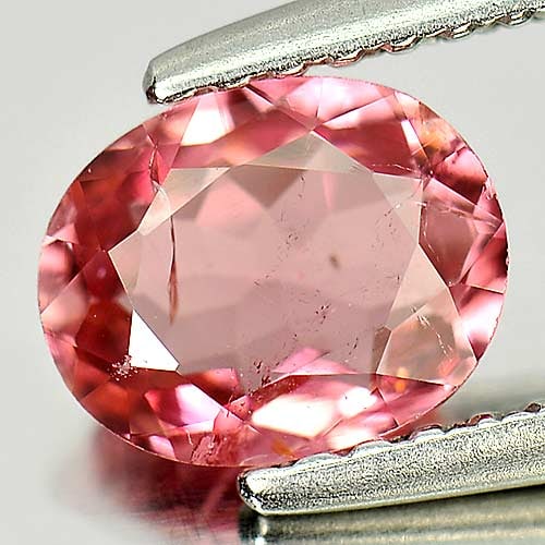 Natural Pink Tourmaline 0.87 Ct. Oval Shape 6.9 x 5.5 Mm. Unheated Gemstone from Nigeria: Product ID: 807245997 Product Name: Natural Tourmaline Weight: 0.87 CT. Size: 6.9 x 5.5 x 3.1 MM. Shape: Oval Color: Pink Clarity:SI1 Luster: Very Good Gems Origin: Nigeria Treatment: Unheated Crystal