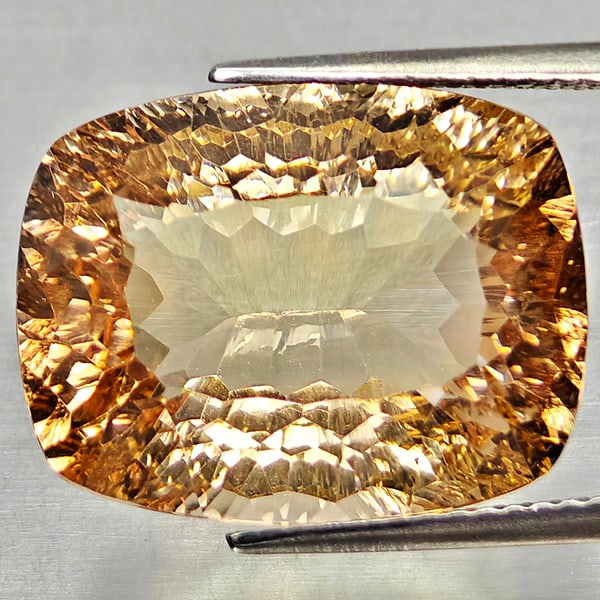 Natural Imperial Topaz 17.80 Ct. Cushion Concave Cut 13.5 x 17.4 Mm Gemstone from Brazil: Product ID: 807168276 Product Name: Natural Topaz Weight: 17.80 CT. Size: 13.5 x 17.4 x 9.1 MM. Shape: Cushion Concave Cut Color: Imperial Clarity:VSI Luster: Very Good Gems Origin: Brazil Treatment:
