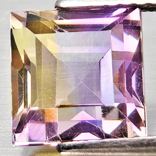 Natural Bi Color Ametrine 3.23 Ct. Octagon Shape 8.2 x 8.2 Mm Gemstone from Bolivia: Product ID: 800408377 Product Name: Natural Ametrine Weight: 3.23 CT. Size: 8.2 x 8.2 x 6.5 MM. Shape: Octagon Color: Bi Color Clarity:VSI Luster: Good Gems Origin: Bolivia Treatment: Unheated Crystal