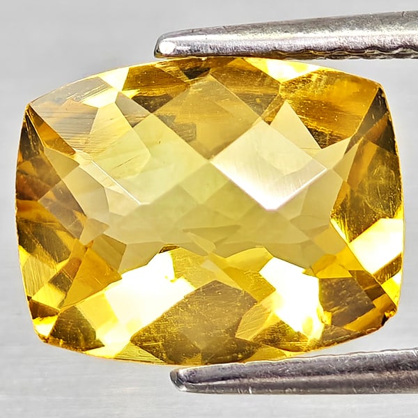 Natural Yellow Citrine 2.55 Ct. Cushion Checkerboard Cut 10.2 x 8.2 Mm Gemstone From Brazil: Product ID: 801815241 Product Name: Natural Citrine Weight: 2.55 CT. Size: 10.2 x 8.2 x 5.2 MM. Shape: Cushion Checkerboard Cut Color: Yellow Clarity:VVS - VSI Luster: Good Gems Origin: Brazil Treatme