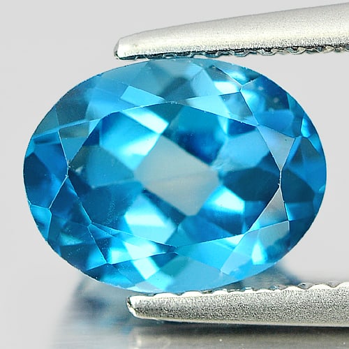 Natural London Blue Topaz 2.40 Ct. Oval Shape 9.2 x 7.1 Mm Gemstone From Brazil: Product ID: 807161008 Product Name: Natural Blue Topaz Weight: 2.40 CT. Size: 9.2 x 7.1 x 4.7 MM. Shape: Oval Color: London Blue Clarity:VSI Luster: Good Gems Origin: Brazil Treatment: Treated Crystal