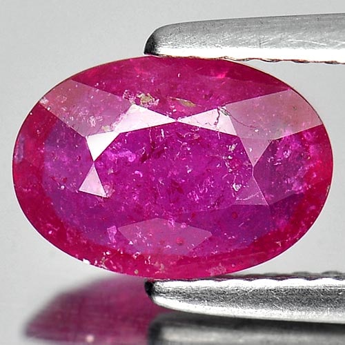 Natural Purplish Pink Ruby 1.57 Ct. Oval Shape 8.9 x 6.2 Mm. Gemstone From Mozambique: Product ID: 805917997 Product Name: Natural Ruby Weight: 1.57 CT. Size: 8.9 x 6.2 x 2.9 MM. Shape: Oval Color: Purplish Pink Clarity:VSI Luster: Good Gems Origin: Mozambique Treatment: Heated (Lead-gl