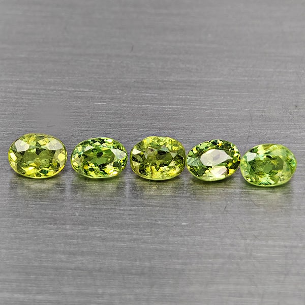 Natural Green Demantiod Garnet 1.24 Ct. 5 Pcs. Oval Shape 4.1 x 3 Mm. Unheated Gemstones From: Product ID: 802937596 Product Name: Natural Demantoid Weight: 1.24 CT. Size: 4.1 x 3 x 2.1 MM. Shape: Oval Shape Color: Green Clarity:SI1 Luster: Very Good Gems Origin: Madagascar Treatment: Unheated