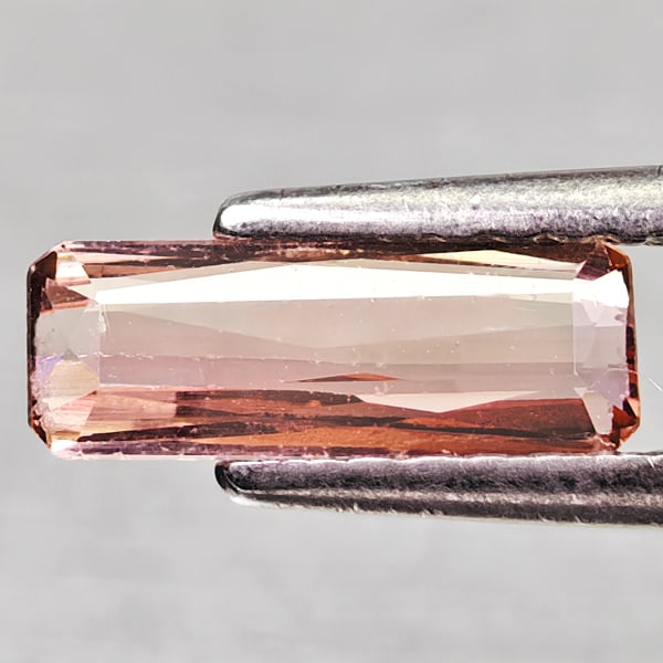 Natural Party Color Pink Tourmaline 0.74 Ct. Octagon Shape 9 x 3.4 Mm Gemstone from Nigeria: Product ID: 807250539 Product Name: Natural Tourmaline Weight: 0.74 CT. Size: 9 x 3.4 x 2.5 MM. Shape: Octagon Color: Party Color Pink Clarity:VSI Luster: Good Gems Origin: Nigeria Treatment: Unheated